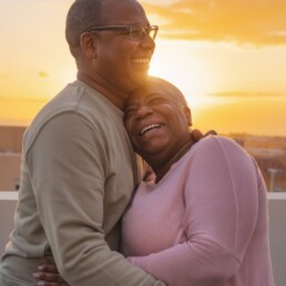 CF What Can I Use Equity Release For Image | image of an elderly couple hugging in front of a sunset