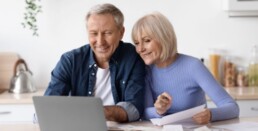 CF Wills Image | image of an elderly couple using a laptoop